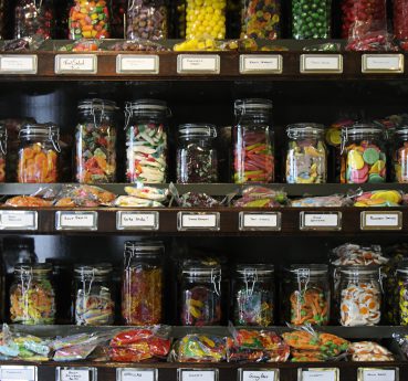 Rows of old-fashioned candy/lollies/sweets in jars