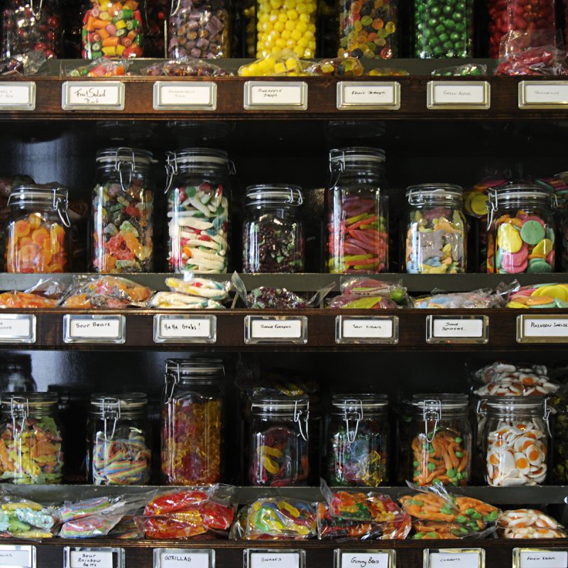 Rows of old-fashioned candy/lollies/sweets in jars